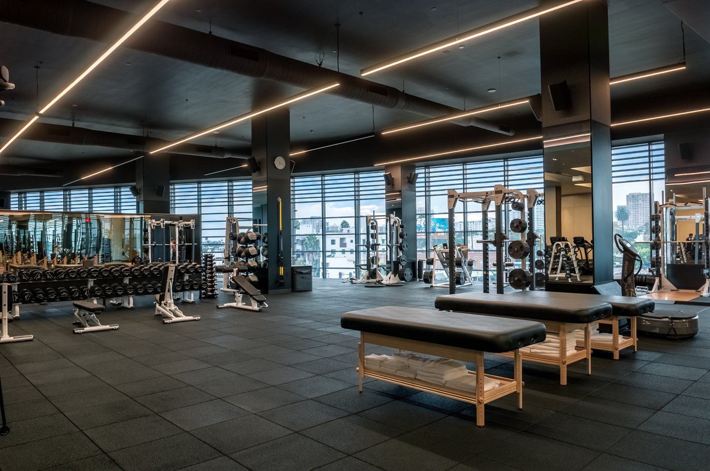 Equinox Century City training floor with linear lighting